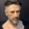 Right side profile of hyper realistic mask highlighting fine skin details and realistic craftsmanship.