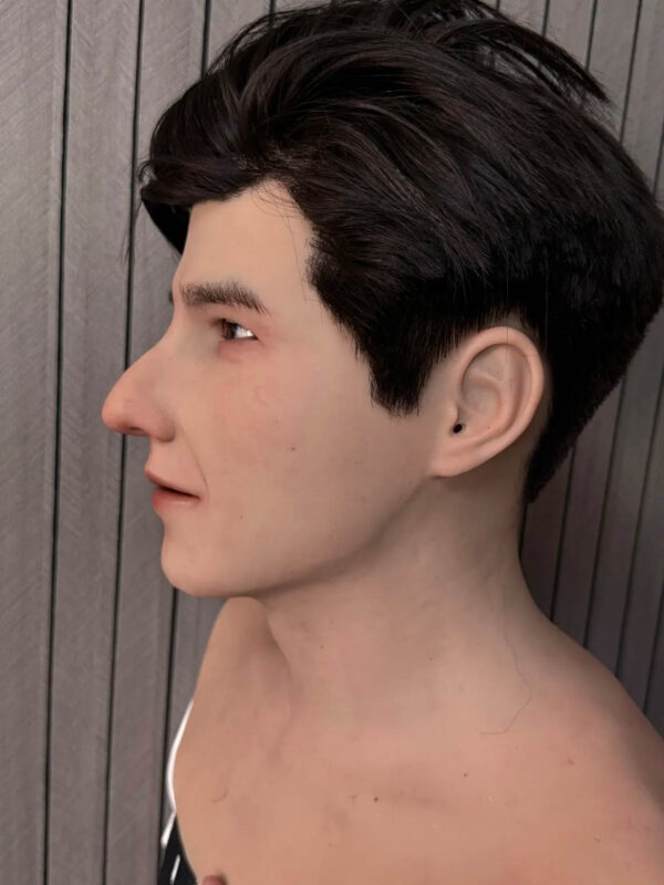 Left profile of a realistic silicone face mask with black hair