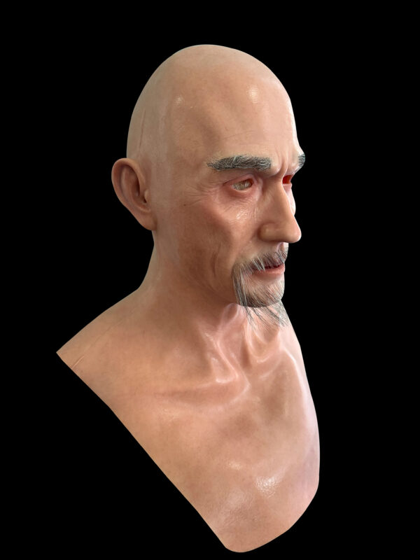 Right side view of old man mask with visible skin texture and natural aging effects