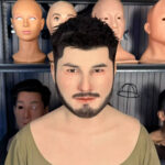 Front view of a realistic human face mask featuring lifelike male facial features