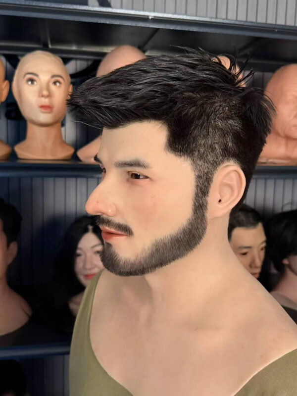 Left profile of a realistic human face mask with bearded male features