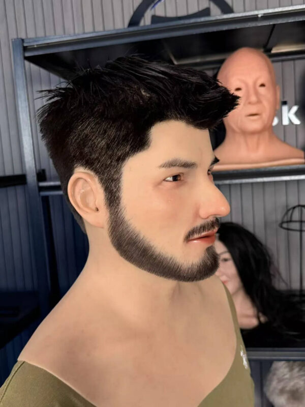 Right profile of a hyper realistic human face mask showing detailed facial texture