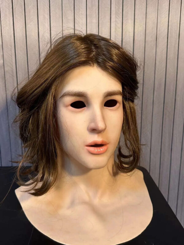 Right side profile of realistic masks showing the lifelike features of a short-haired girl