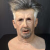 Realistic old man mask front view showing detailed wrinkles and lifelike facial features