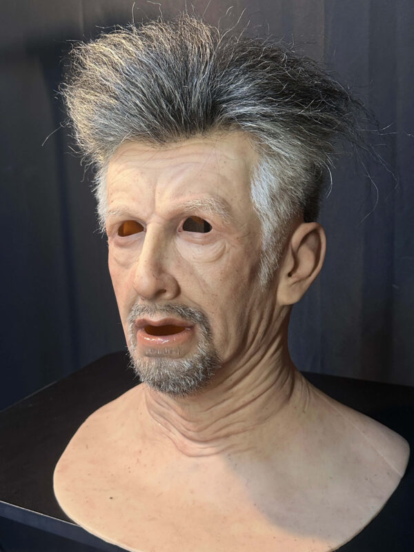 Left side profile of a realistic old man mask highlighting ear sculpting and facial contours