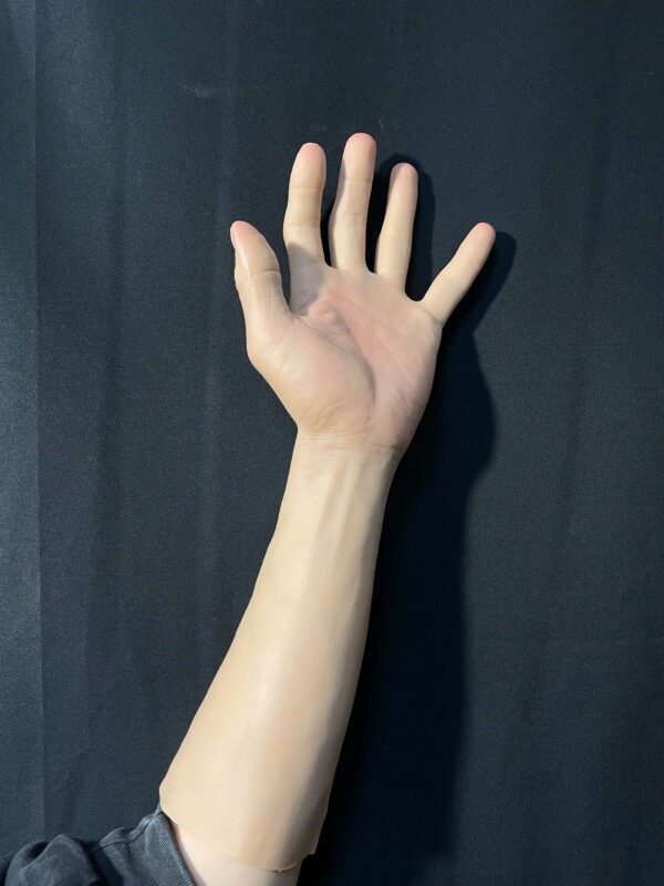 Back view of realistic silicone gloves displaying wrist and palm realism
