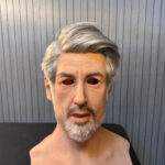 Realistic silicone masks front view of elderly man with white hair and beard
