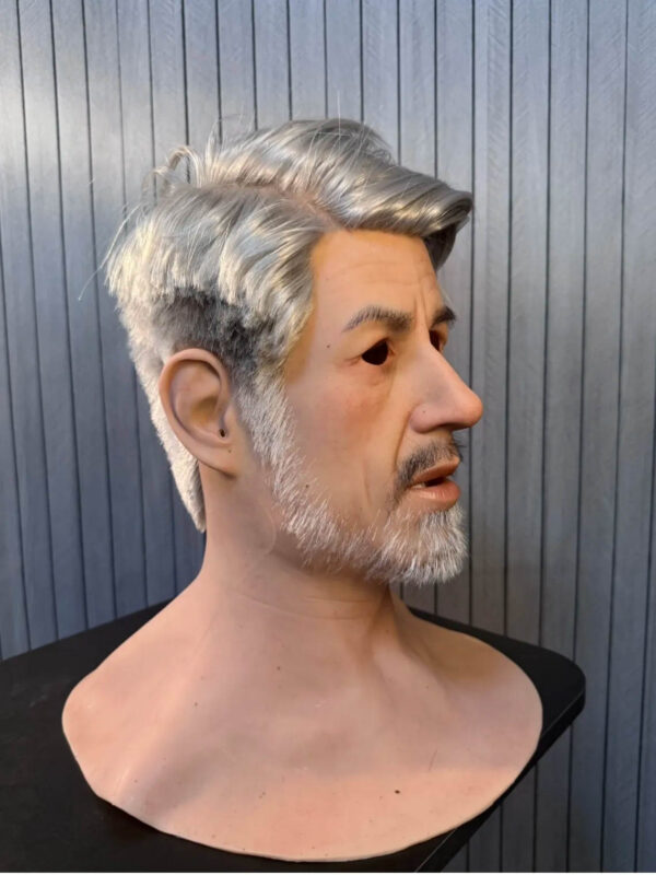 Right angle view of platinum silicone elderly man masks