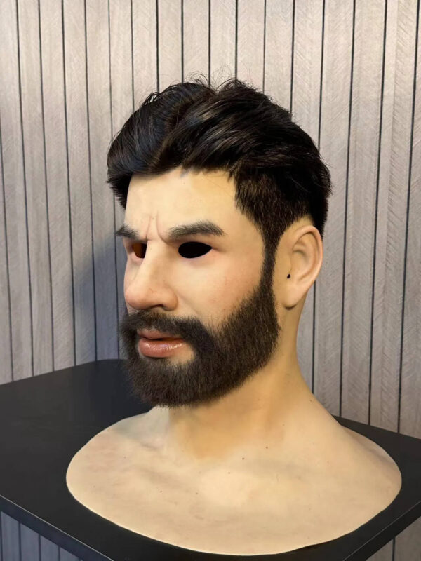 Left profile of a realistic silicone face mask with defined cheekbone and beard texture
