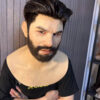 Man wearing a silicone face mask with realistic beard and natural expression