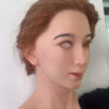 Realistic female mask left side profile with brown hair