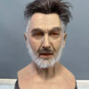 Front view of realistic silicone mask of elderly man with white beard