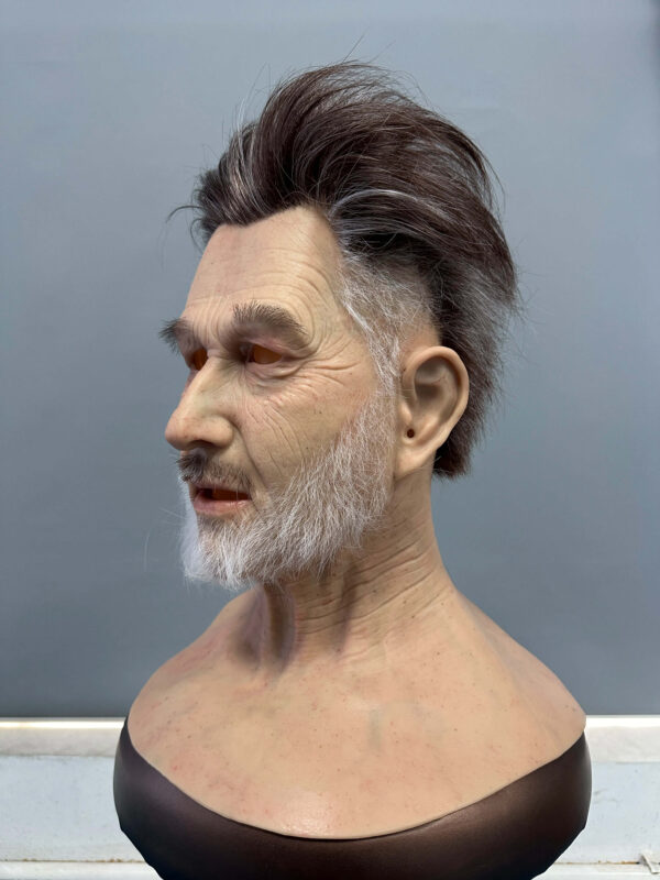 Left side view of white-bearded silicone mask for cosplay or film
