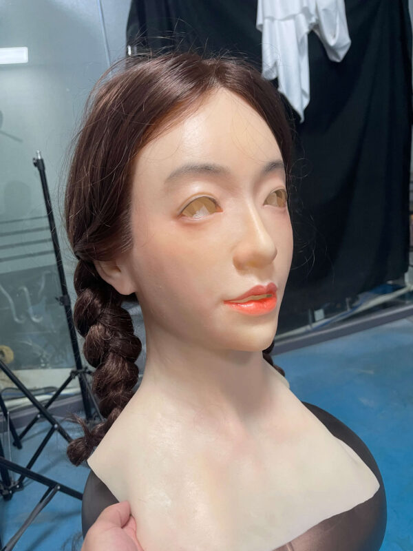 Silicone masks female left side profile with natural hair and facial detail