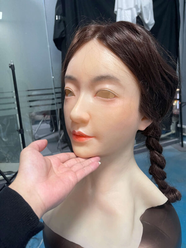 Silicone masks female right side profile displaying detailed skin texture and hairstyle